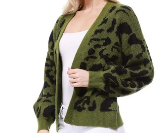 May include: A green and black leopard print cardigan with long sleeves and a v-neck.