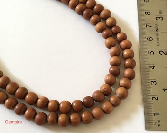 Sandelhouten kralen 7 mm 5 strengen (545 kralen) / Groothandelsverpakking 108 gebedskralen