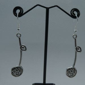 Silver hanging earrings image 1