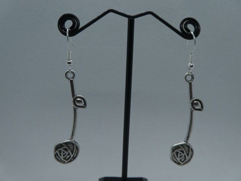 Silver hanging earrings image 1