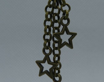 Chain-optic earrings with stars