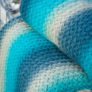 Blanket knitted with natural wool