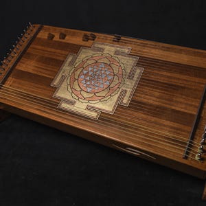 Monochord 34 strings with Srī Yantra power