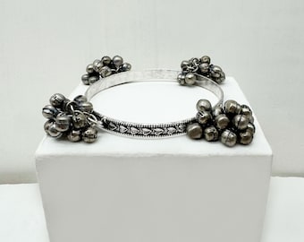 Silver-plated bangle bracelet engraved with an ethnic motif and adorned with bells / boho ethnic jewelry