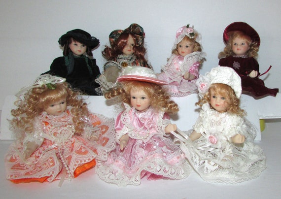 sitting porcelain dolls