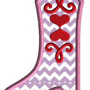 May include: Pink boot with a chevron pattern and red heart and swirl designs.
