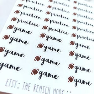 May include: A sheet of white stickers with brown football illustrations. The stickers have the words "practice" and "game" written in black cursive.