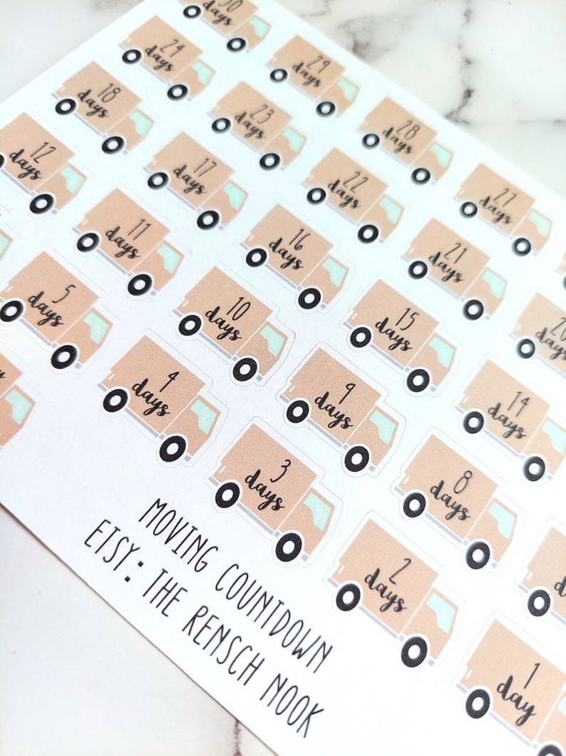 May include: A set of 30 moving countdown stickers featuring a cartoon moving truck with a light brown body and a light blue door. Each sticker has a number from 1 to 30 with the word "days" written next to it. The stickers are printed on white paper with the text "MOVING COUNTDOWN ETSY: THE RENSCH NOOK" at the bottom.