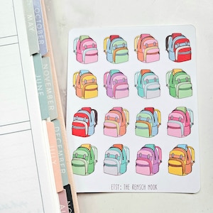 May include: A sheet of 12 colorful backpack stickers. Each sticker features a different color combination of a backpack with a book inside. The stickers are perfect for adding a touch of personality to planners, laptops, water bottles, and more. The text "ETSY: THE RENSCH NOOK" is printed at the bottom of the sheet.