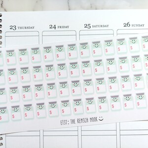 May include: Sheet of planner stickers featuring smiling jar illustrations with dollar signs. The stickers are light green with gray lids and pink dollar signs. The sheet is on a planner page with the text "ETSY: THE RENSCH MOOK".