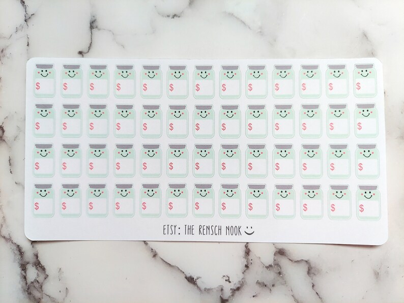 May include: Sheet of stickers featuring smiling jars with dollar signs and blank labels. The jars are light green with gray lids and happy faces. The text "ETSY: THE REMSCH MOOK" is at the bottom.