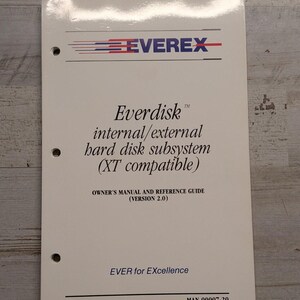 May include: A white Everex Everdisk internal/external hard disk subsystem owner's manual and reference guide, version 2.0, XT compatible. The cover features the Everex logo, the text EVER for EXcellence, and the part number MAN-00007-20.