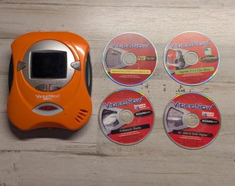 VideoNow Personal Video Player Orange Hasbro 2001 with 4 PVD Discs Works