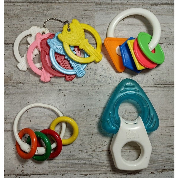 Lot of 4 Vintage Baby Teething Ring Toys Keys First Years Avon Danara Celluloid