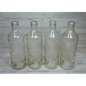 2 Vintage Coke Bottles Pint 16 oz NO DEPOSIT NO RETURN Clear Glass with lids