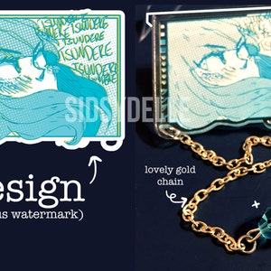 May include: A blue and white anime-style illustration of a girl with long hair, printed on a 1.5 inch acrylic pin with a gold chain and a blue diamond bead. The pin is labeled "TSUNDERE" in yellow text.