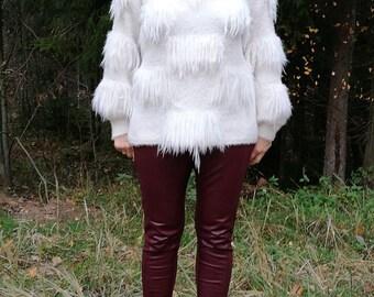 white fluffy sweaters