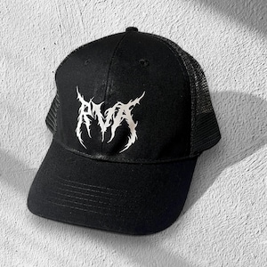 May include: Black and white trucker hat with a white metal logo that says "RVA" on the front.