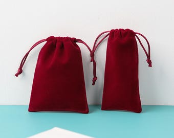 100 stuks op maat gemaakte bulk fluwelen tassen met trekkoord voor sieraden, kerstcadeaus, feestartikelen en boetiekverpakkingen P304
