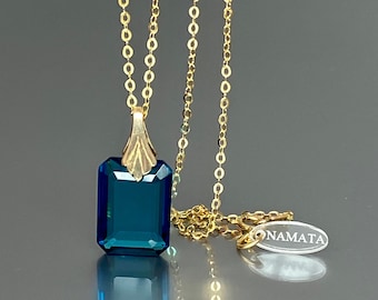 Halskette mit Anhänger aus 14-karätigem Gold und London Blue Topas: Smaragdschliff, Geburtsstein für Dezember