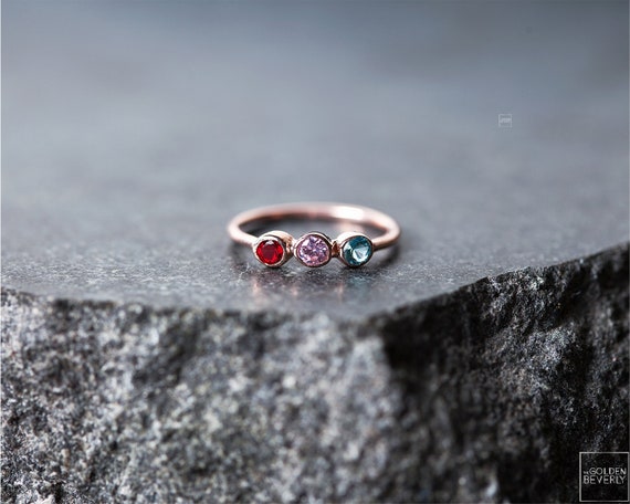 Dual birthstone hotsell engagement rings