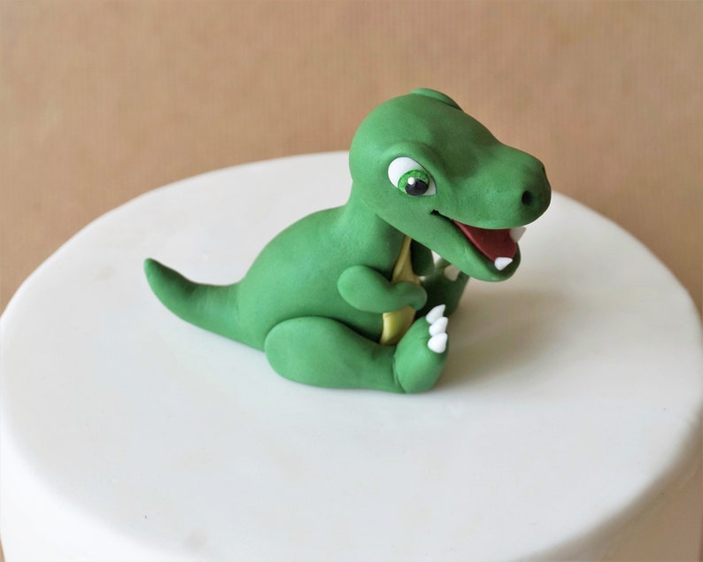 blue dinosaur cake topper