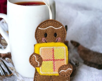 Gingerbread person holding a piece of Battenberg cake, gift, keepsake, birthday, Christmas, Mother’s Day, valentines,