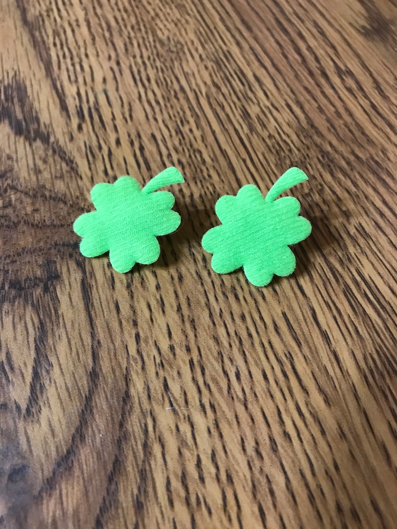 Light green four leaf clover clip on earrings