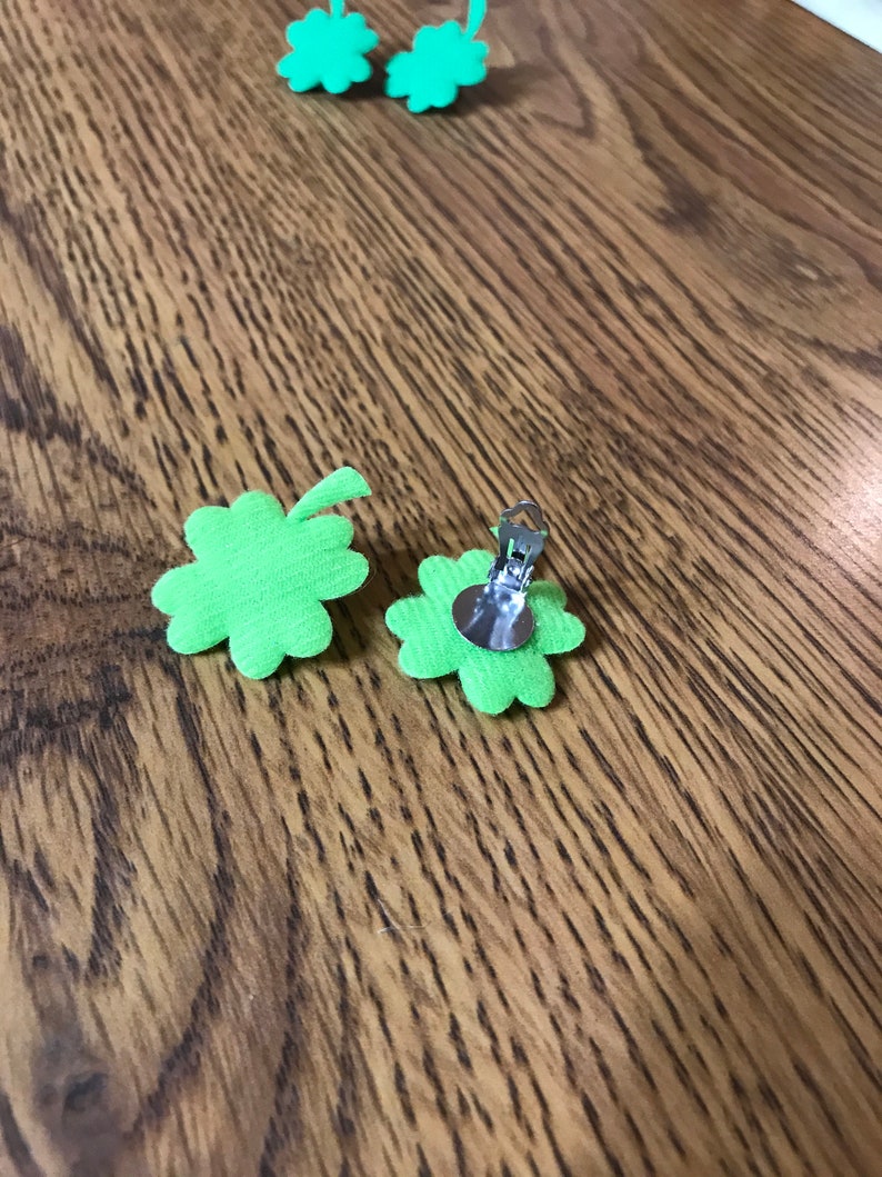 Light green four leaf clover clip on earrings