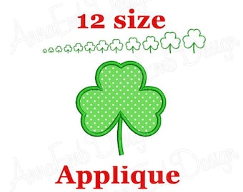 May include: Green shamrock applique with white polka dots. The applique is available in 12 sizes. The text "Applique" is written in red below the shamrock.