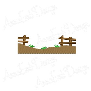 May include: A brown dirt path with two small wooden fences and green grass growing on either side.