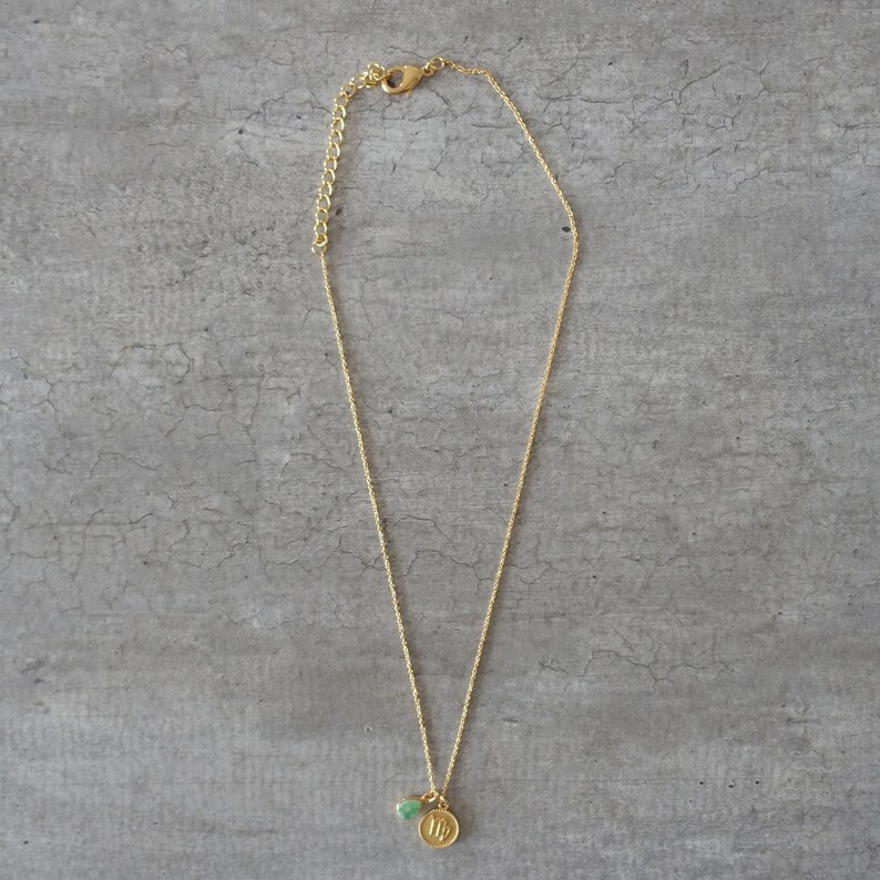 Gouden ketting met medaille van het astrologische teken Maagd en hanger