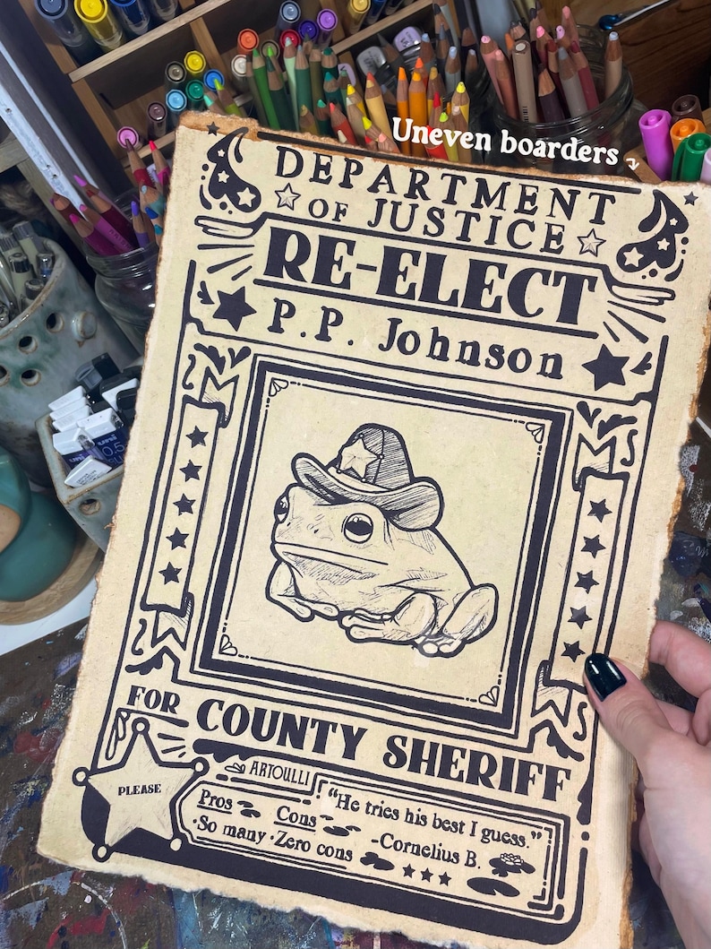 May include: A vintage-style poster with a cartoon frog wearing a sheriff's hat. The poster reads "Department of Justice, Re-Elect P.P. Johnson for County Sheriff". The poster has a distressed look and is printed on brown paper.