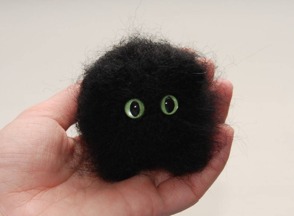 stuffed black kitten