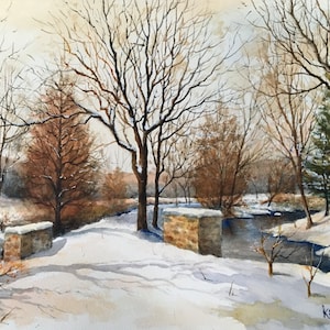 May include: A watercolor painting of a snowy winter scene with a stream running through a forest. The trees are bare and the ground is covered in snow. There are stone walls on either side of the stream. The artist's signature, "Krill", is in the lower right corner.