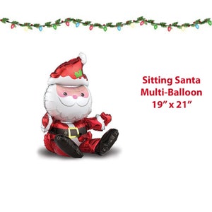 May include: A sitting Santa Claus multi-balloon, 19" x 21", in red, white, and black. The balloon features a smiling Santa with a white beard and a red suit with a black belt. A string of Christmas lights is above the balloon.