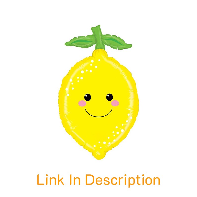 May include: A yellow lemon balloon with a smiling face and green leaves. The balloon has white dots on it.