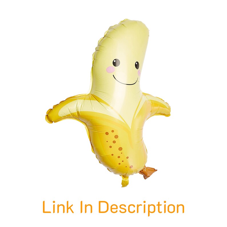 May include: A yellow banana-shaped balloon with a smiling face and brown spots. The balloon has a small brown stem.