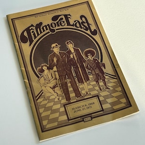 May include: A vintage concert program titled "Fillmore East" in shades of brown and tan. The cover features stylized illustrations of people in vintage attire. The program's dates are March 8, 1968, and June 27, 1971.