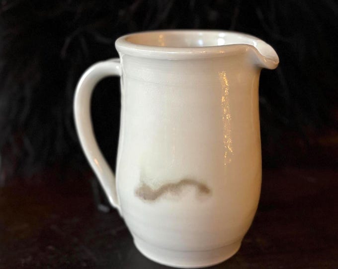 70s Primitive Cream Colored Stoneware Pitcher 7.25”, Signed