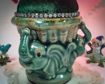 Pincushion. 3 Elephants, Green Velvet, Rhinestone Garland, Vintage Chinese Ceramic Figurine   4" W by 4.25" H,  13 oz net, #5422 Pin Cushion