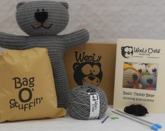 Grey Teddy Bear Knit Kit with easy to follow illustrated pattern including yarn, knitting needles, sewing needle,stitch marker and stuffing.