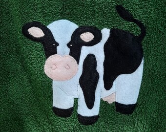 Cow Bib - a towel bib for future farmers.  Absorbent and comfortable - and machine washable, too!  Handmade in Canada.