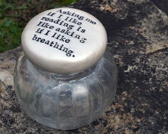 Asking if I like reading is like asking if I like breathing. Glass Stash Jar