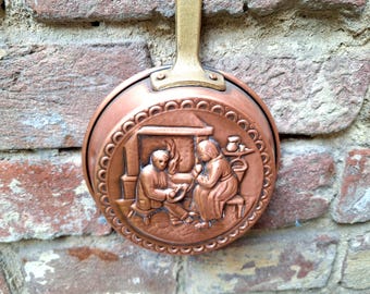 Rural Medieval Theme By the Fireplace, copper baking mold frying pan vintage kitchen decor