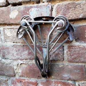 Antique bicycle saddle Rusty Metal Wall Home or Garden Decor