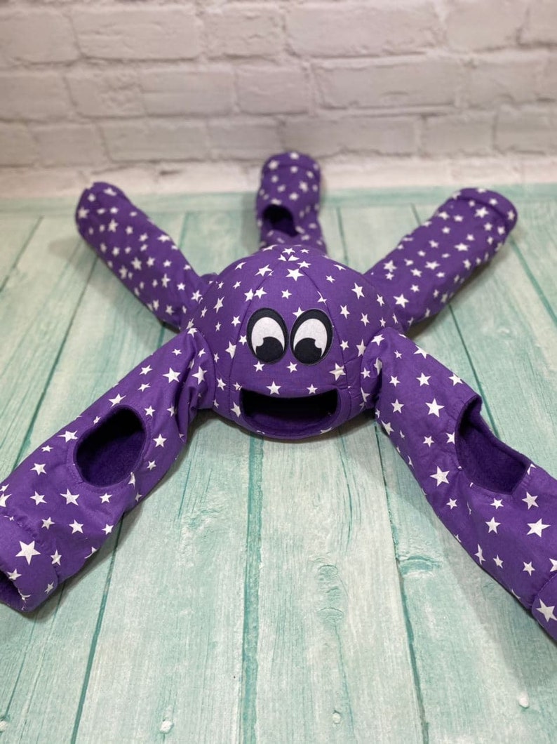 Game octopus in stars for rats. ferrets, guinea pig, octopus for fun games. irreplaceable toy for your pets. Purple