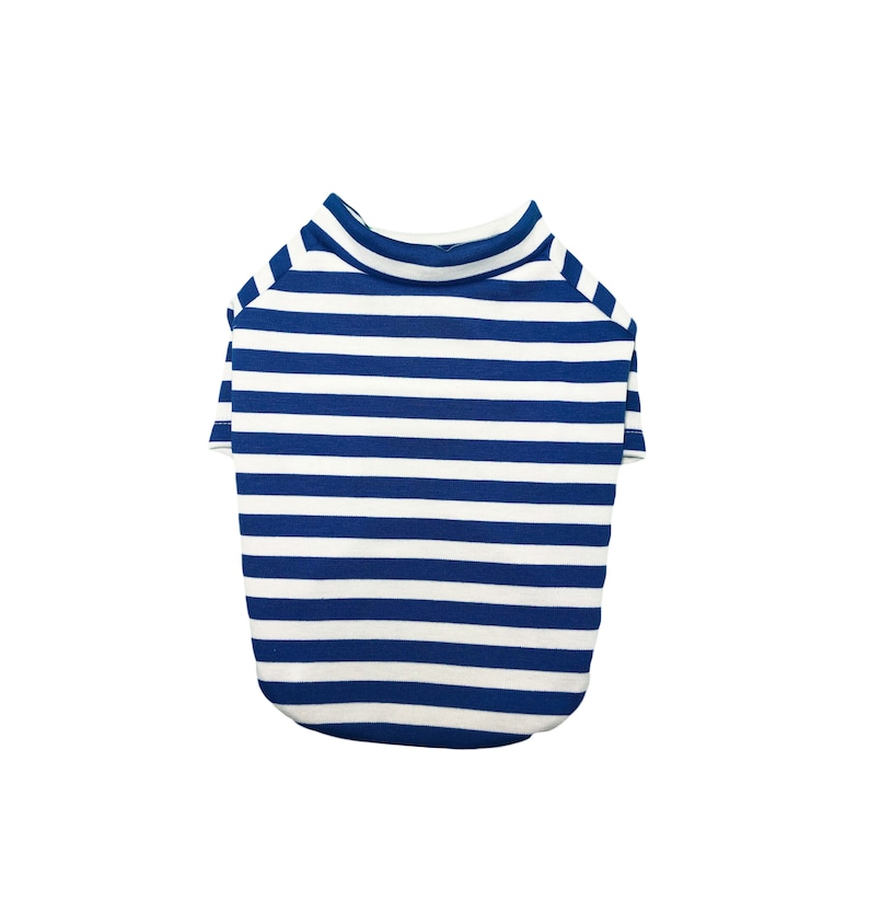 May include: A blue and white striped dog shirt. The shirt has a crew neck and short sleeves.