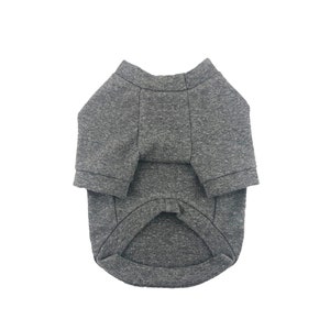 May include: A gray heather dog t-shirt with short sleeves.
