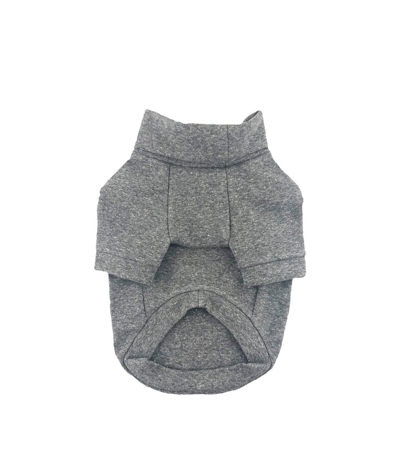 May include: A gray turtleneck sweater for a pet. The sweater has a ribbed collar and a long body.